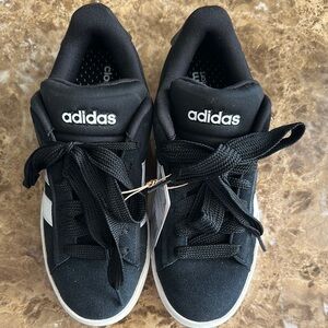 Adidas Black and White Casual Sneakers
Never worn